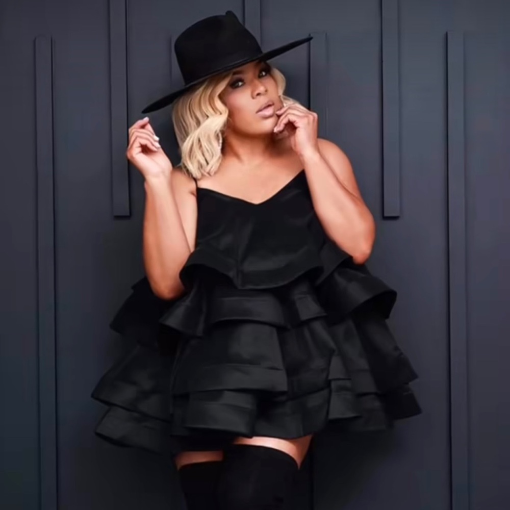 On and Off the RunWay Black Tiered Dress. Brand New With Tags attached.